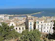 Cityscape picture of Algiers, showing the coastline
