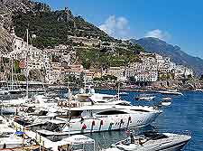 Amalfi beachfront image, showing marina and luxury yachts