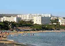 Picture of beachfront accommodation and tourists