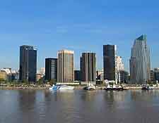 Image of high-rise buildings, reflecting in the waterfront