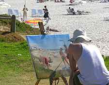 Picture of artist painting at Camps Bay