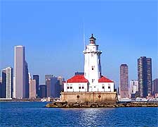 Photo showing the historic Harbor Lighthouse and skyline, taken by Richard C. Drew