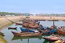 Photo of beach and boats