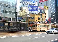 Photo showing car driving around the city centre