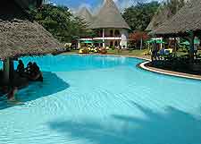 Picture showing Kenyan resort complex with swimming pool