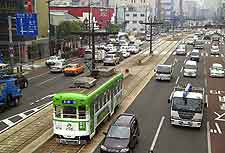 View of cars driving around the city