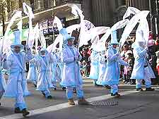 Image of seasonal parade through the city's streets