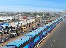 Image of buses queued up and awaiting passengers in Lagos