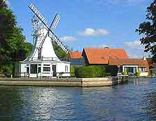 Photo of a Norfolk Broads riverfront windmill