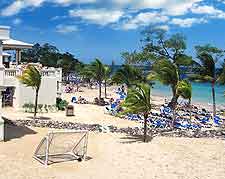 Picture of holiday makers soaking up the sun on the beach at Ocho Rios