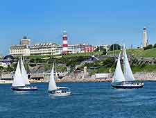 Photo of sailing boats passing the Hoe