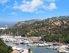 Photo of yachts moored along Sardinia's scenic Costa Smeralda