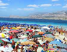 Further photo of sunseekers on Spiaggia della Pelosa Beach