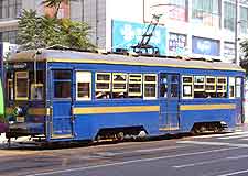Image of bus driving around the city