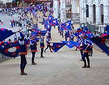 Photo of city parade, with dancers