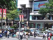 Photograph of shoppers and attractions on Orchard Road