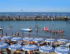 Beachfront view, showing summer parasols