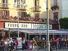 Photo of cafe tables and diners