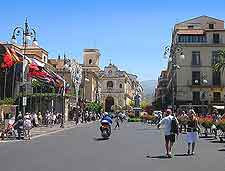 Photo of tourists strolling around the Piazza Tasso