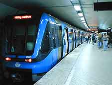 Picture of subway station and arriving train