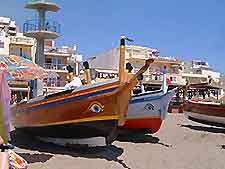 Picture showing boats along the beachfront