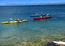 Photo of visitors kayaking in the summer