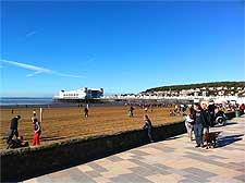 Photo of the beach, paved promenade and new pier at Weston Super Mare, near Bristol